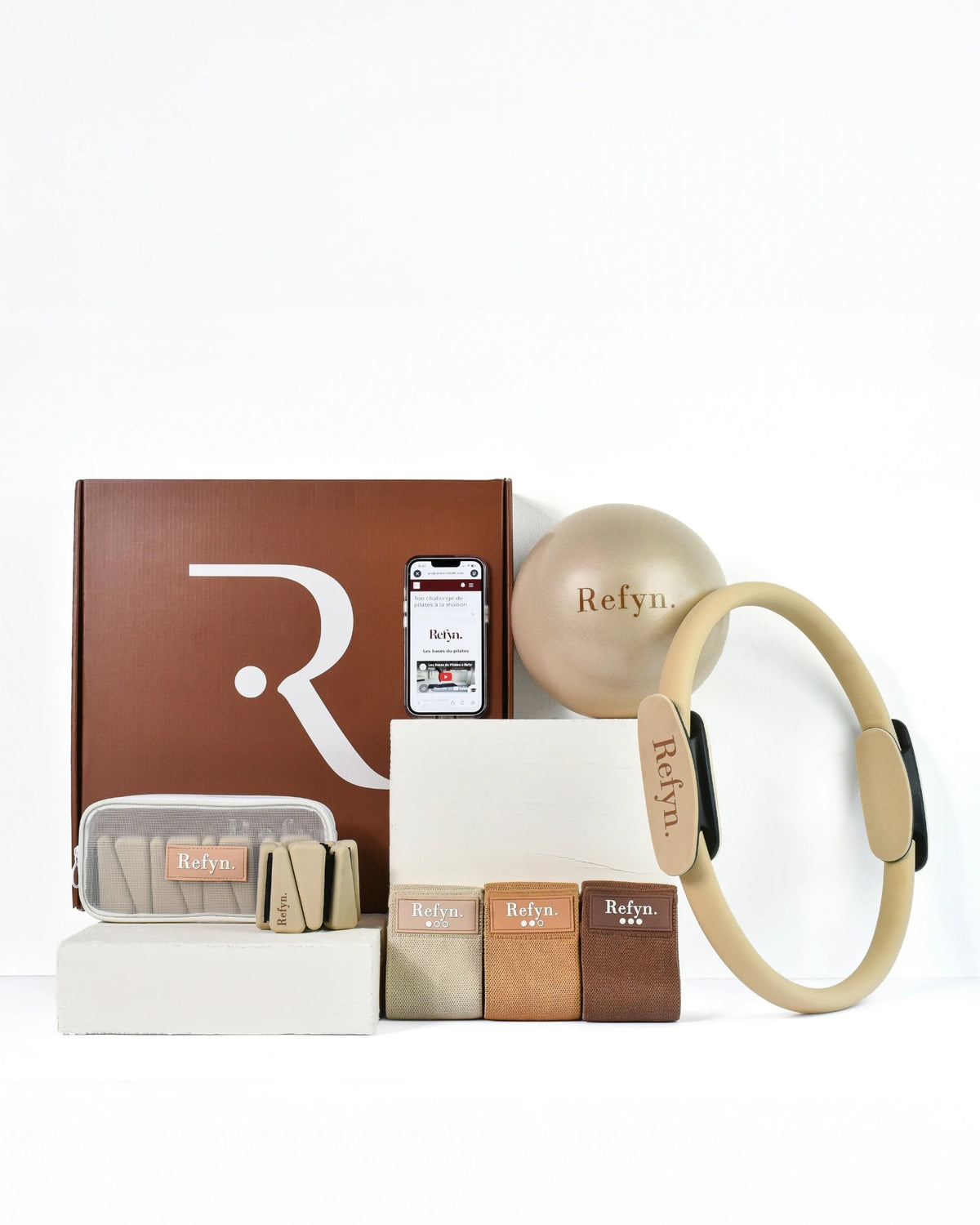 Refyn Sculpt Set — Kit Pilates complet avec ring, ball, bandes de résistance et chevilles lestées