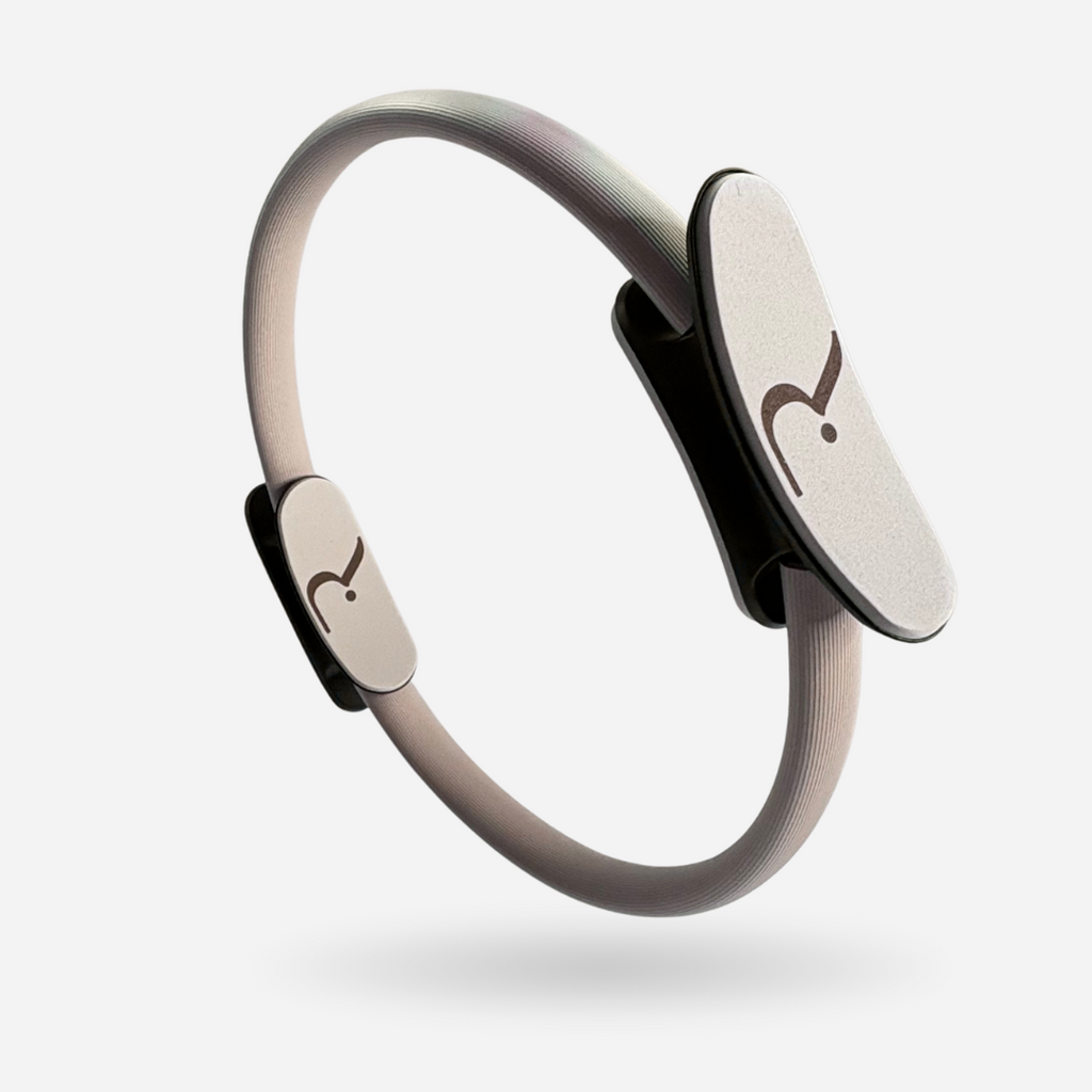 Anneau de pilates beige cercle de résistance pour renforcement musculaire